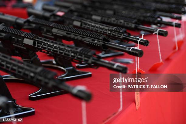 Arms LLC California-legal featureless AR-15 style rifle is displayed for sale at the company's booth at the Crossroads of the West Gun Show at the...