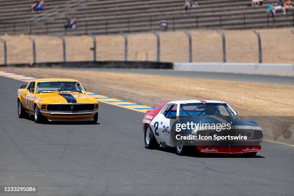 Trans Am Racing Background Classic cars race around the track during the historic Trans Am Race ...