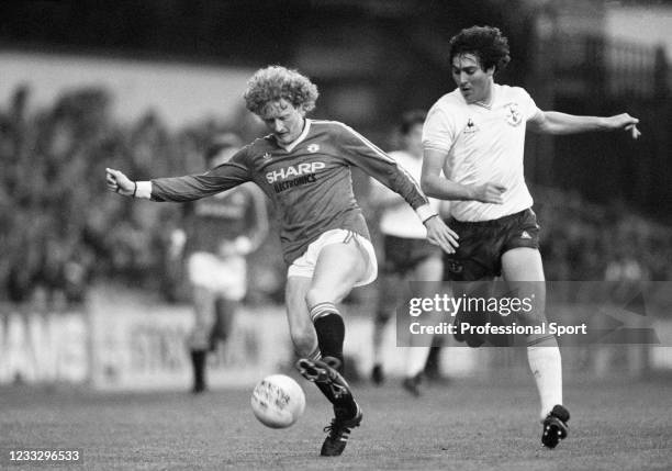 Ashley Grimes of Manchester United shields the ball from Paul Miller of Tottenham Hotpsur during a Football League Division One match at White Hart...