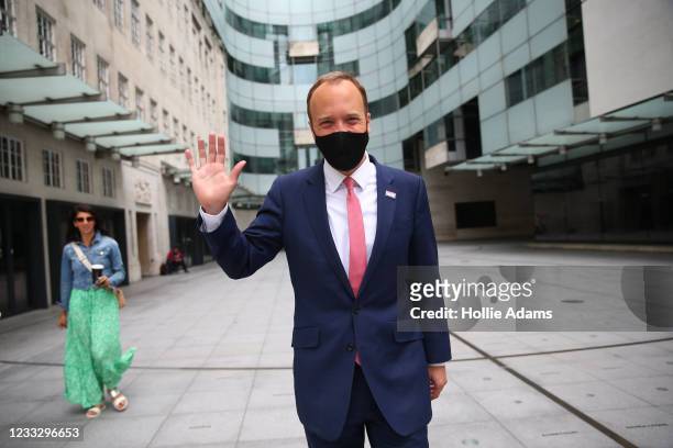 Secretary of State for Health and Social Care, Matt Hancock gestures to the media before appearing on The Andrew Marr show on the BBC, followed by...