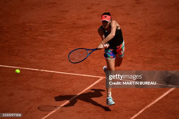 Romania's Sorana Cirstea returns the ball to Slovenia's Tamara Zidansek during their women's singles fourth round tennis match on Day 8 of The Roland...