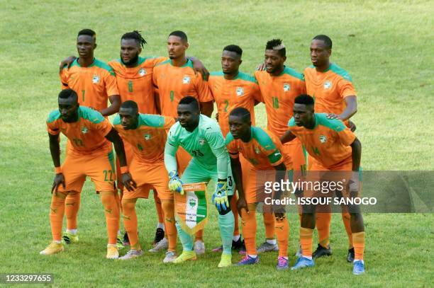 Ivory Coast's national football team players pose for a photograph before a friendly football match between Ivory Coast and Burkina Faso at the...