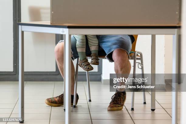 Voters cast their ballots in Saxony-Anhalt state elections on June 6, 2021 in Wittenberg, Germany. Polls show the election is a tight race between...
