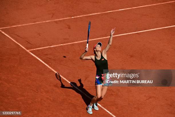 Romania's Sorana Cirstea serves the ball to Slovenia's Tamara Zidansek during their women's singles fourth round tennis match on Day 8 of The Roland...