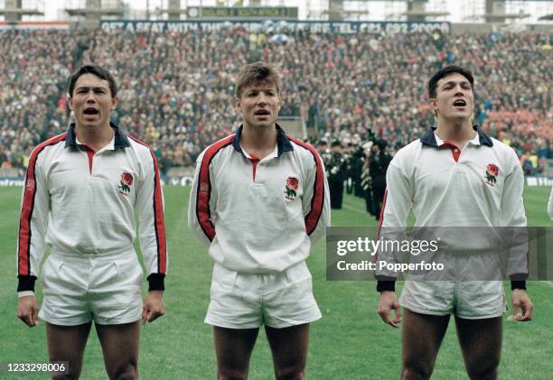 Rory Underwood , Rob Andrew and Tony Underwood of England line up for the national anthems before the Rugby Test Match between England and South...