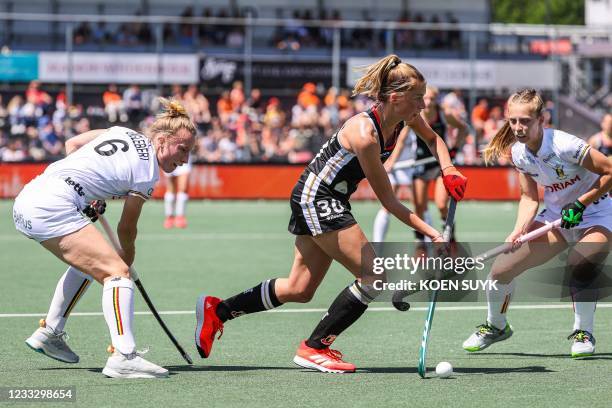 Charlotte Englebert of Belgium vies with (Hanna Granitzki of Germany during the European field Hockey Championship match between Germany and Belgium...