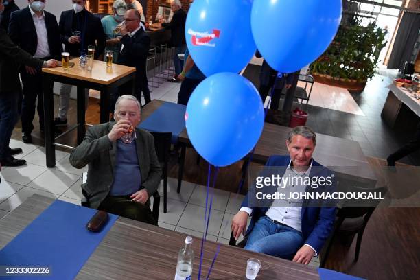 Alexander Gauland , parliamentary group co-leader of Germany's far-right Alternative for Germany party, and Thuringia's AfD leader Bjoern Hoecke sit...