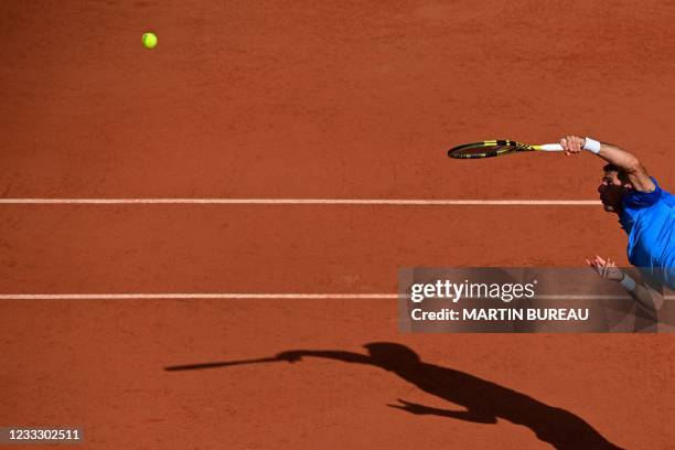 Argentina's Federico Delbonis serves the ball to Spain's Alejandro Davidovich Fokina during their men's singles fourth round tennis match on Day 8 of...