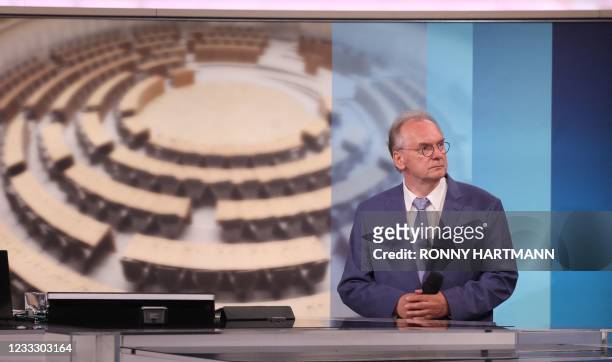 Saxony Anhalt's State Premier Reiner Haseloff, top candidate of his conservative Christian Democratic Union's party, attends a televised meeting...