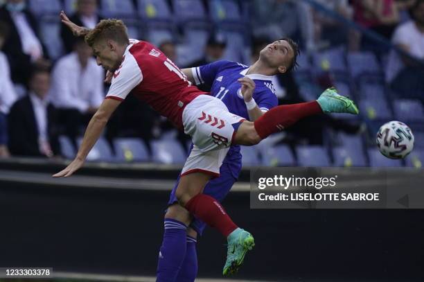 Denmark's Daniel Wass and Bosnia-Herzegovina's forward Ermedin Demirovic vie for the ball during the friendly football match Denmark v...