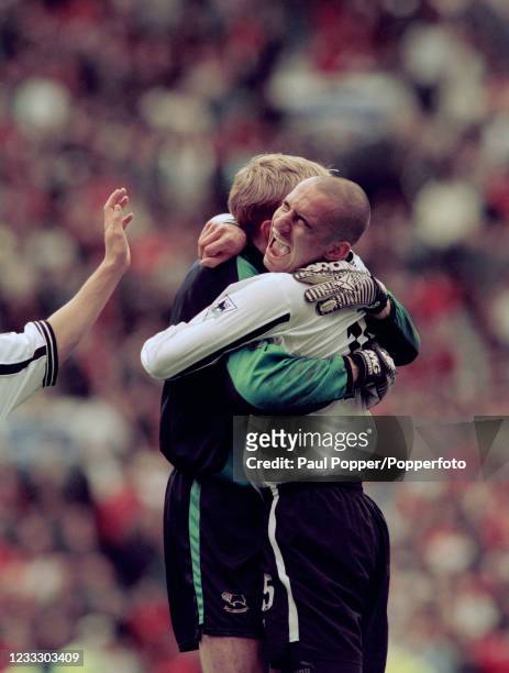 Derby County goalkeeper Mart Poom and teammate Rory Delap celebrate after the FA Carling Premiership match between Manchester United and Derby County...