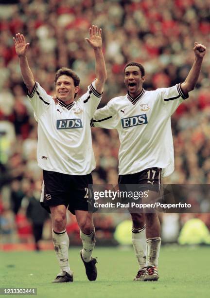 Stefano Eranio and Youl Mawene of Derby County celebrate after the FA Carling Premiership match between Manchester United and Derby County at Old...