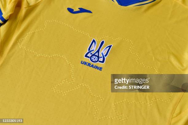 Picture taken on June 6, 2021 shows a EURO 2020 jersey of the Ukrainian national football team. - Ukraine provoked Moscow's ire on June 6, 2021 as...