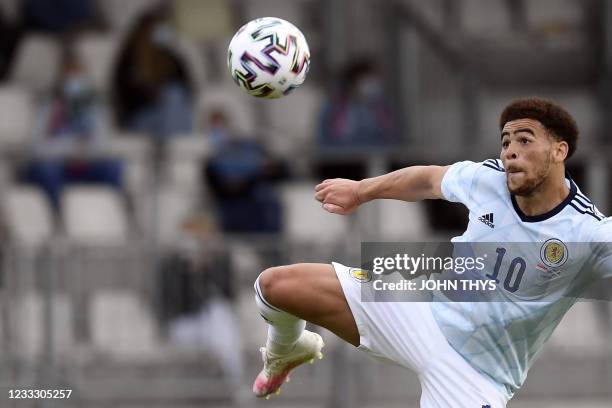 Scotland forward Che Adams looks at the ball during the friendly football match between Luxembourg and Scotland at the Josy Barthel Stadium in...