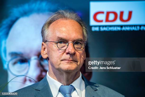 Reiner Haseloff, German Christian Democrat premier of Saxony-Anhalt reacts to initial results in Saxony-Anhalt state elections on June 6, 2021 in...