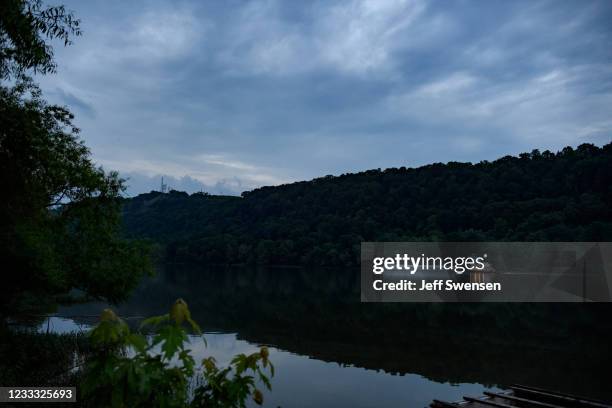 Barge is navigated along the Allegheny River to the GenOn Cheswick Power Station, which still burns coal to produce 637 megawatts of electricity for...