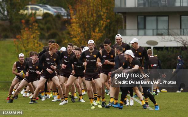 Players warm up during the Hawthorn training session at Waverley Park on June 08, 2021 in Melbourne, Australia.