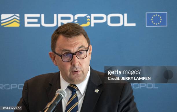 Jean-Philippe Lecouffe, deputy director of EU police agency Europol delivers a speech during a press conference, on June 8, 2021 in The Hague. -...