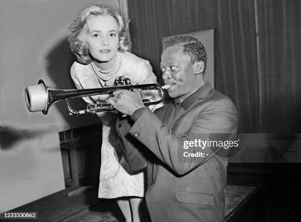 Trumpet player Miles Davis gives a lesson to French actress Jeanne Moreau in Paris on 05 December 1957. Davis was asked by French director Louis...