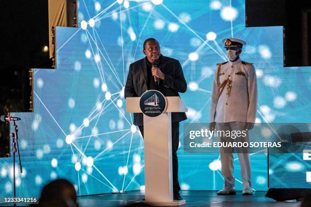 Uhuru Kenyatta, President of Kenya, addresses the public during the ceremony for the signing of Ethiopias telecom licensing agreement, in Addis...