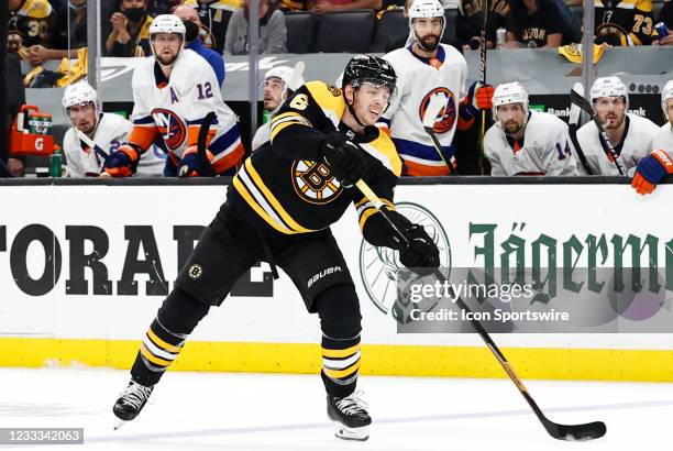 Boston Bruins left defenseman Mike Reilly shoots during Game 5 of the NHL Stanley Cup Playoffs Second Round between the Boston Bruins and the New...