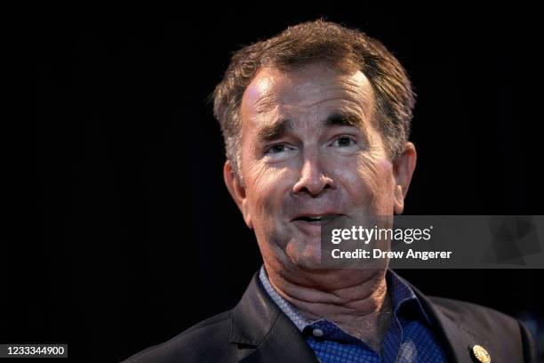 Virginia Governor Ralph Northam speaks before Virginia gubernatorial candidate Terry McAuliffe takes the stage during an election night event after...