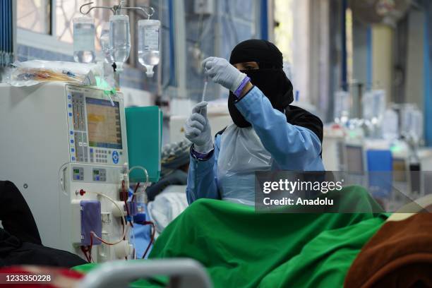 Kidney patient receives dialysis treatment at a hospital in Taiz, Yemen on June 4, 2021 where inadequacy of functioning dialysis machines in the...