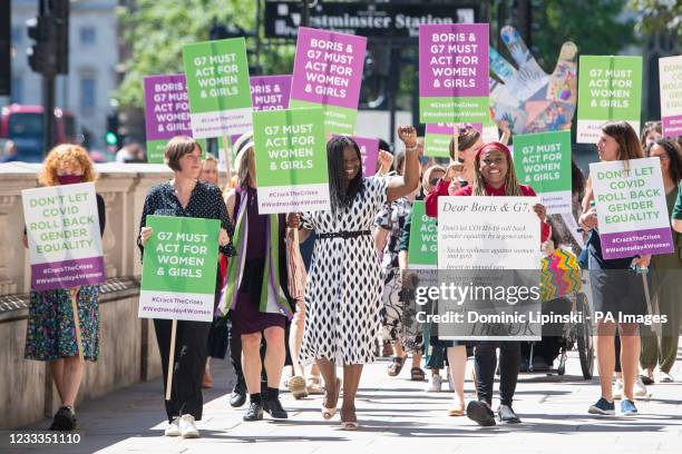 Group of womens rights champions including Jess Phillips MP Shadow Women's and Equality Secretary Marsha de Cordova and Shola Mos-Shogbamimu walk up...