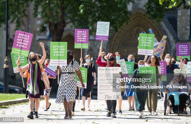 Group of womens rights champions including Helen Pankhurst Shadow Women's and Equality Secretary Marsha de Cordova and Shola Mos-Shogbamimu in...