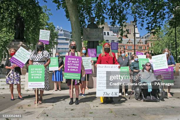 Group of womens rights champions including Shola Mos-Shogbamimu , Helen Pankhurst , and Shadow Women's and Equality Secretary Marsha de Cordova in...