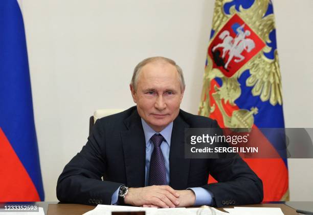 Russian President Vladimir Putin attends the launching ceremony of the Gazprom's Amur Gas Processing Plant, via a video conference, at the...