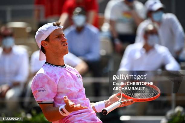 Argentina's Diego Schwartzman reacts as he plays against Spain's Rafael Nadal during their men's singles quarter-final tennis match on Day 11 of The...