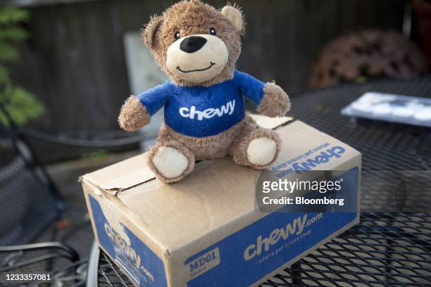 Chewy toy and shipping box arranged in Tiskilwa, Illinois, U.S., on Tuesday, June 8, 2021. Chewy Inc. Is scheduled to release earnings figures on...