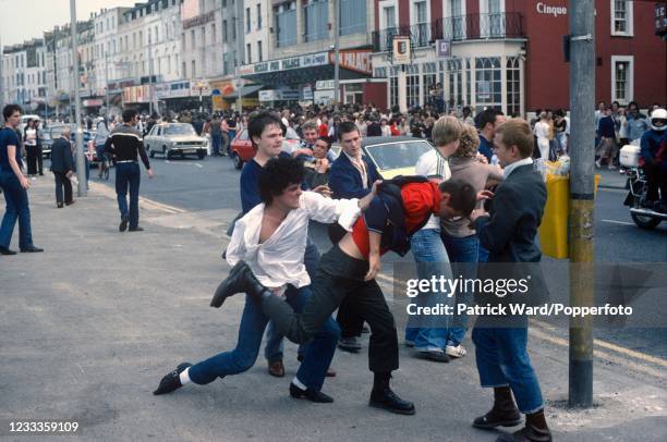 Street fight amongst youths at Margate in Kent, circa June 1985.