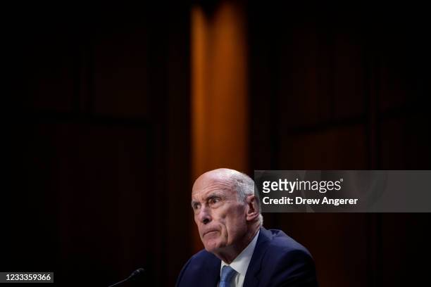 Former Director of National Intelligence Dan Coats speaks during a Senate Intelligence Committee nominations hearing on Capitol Hill June 9, 2021 in...