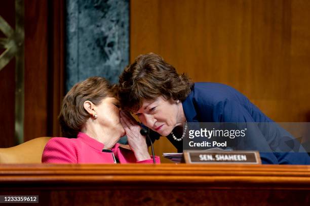 Sen. Jeanne Shaheen , left, speaks to Sen. Susan Collins during a Senate Appropriations Subcommittee on Commerce, Justice, Science, and Related...