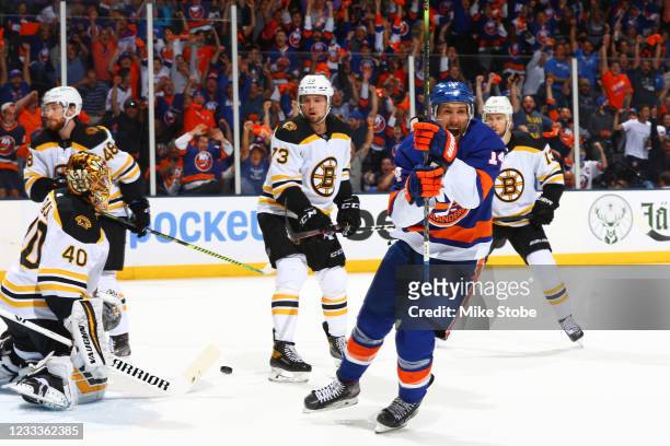 Travis Zajac of the New York Islanders celebrates after scoring a goal past Tuukka Rask of the Boston Bruins during the first period in Game Six of...