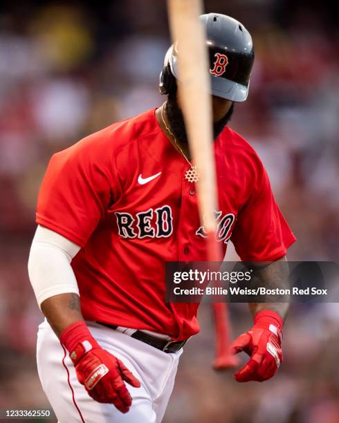Danny Santana of the Boston Red Sox tosses his bat after he walks during the first inning of a game against the Houston Astros on June 9, 2021 at...