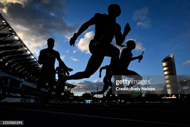 Runners in the 4x400 meter relay take their handoffs during the Division I Men's and Women's Outdoor Track & Field Championships held at Hayward...