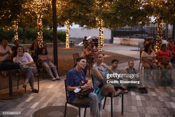 Movie goers watch a screening of "In the Heights" at the Tribeca Film Festival in the Hudson Yards neighborhood of New York, U.S., on Wednesday, June...