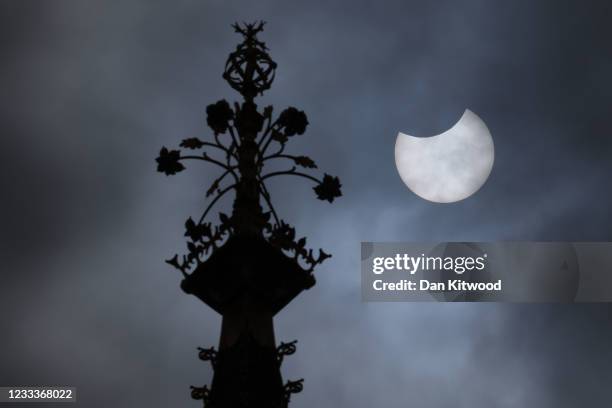 Partial solar eclipse is seen over Big Ben on June 10, 2021 in London, England. Viewers in the UK will witness a partial solar eclipse this morning...