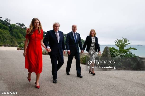 Boris Johnson, U.K. Prime minster, second left, and U.S. President Joe Biden, second right, walk U.S. First Lady Jill Biden, right, and Carrie...