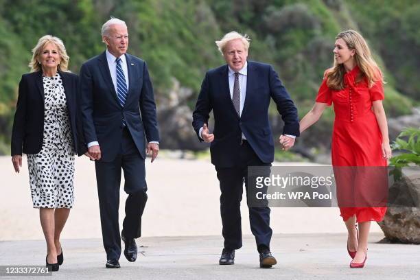 Britain's Prime Minister Boris Johnson, his wife Carrie Johnson and U.S. President Joe Biden with First Lady Jill Bidenn walk outside Carbis Bay...