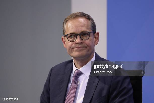 Berlin mayor Michael Müller attends a joint press conference with Chancellor of Germany Angela Merkel and Bavaria's State Premier Markus Soeder after...