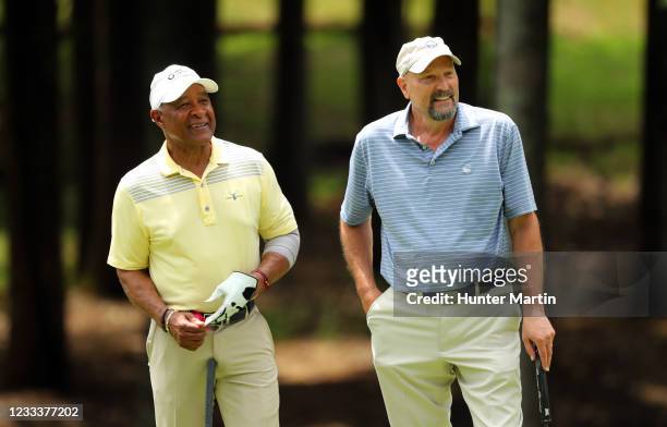 Ozzie Smith and Vincent Cialdella stand on the 12th green during the first round of the BMW Charity Pro-Am presented by Synnex Corporation at the...