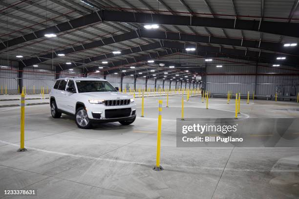 Jeep Grand Cherokee L drives through the BSR 2,000-yard indoor test track at the Stellantis Detroit Assembly Complex-Mack on June 10, 2021 in...