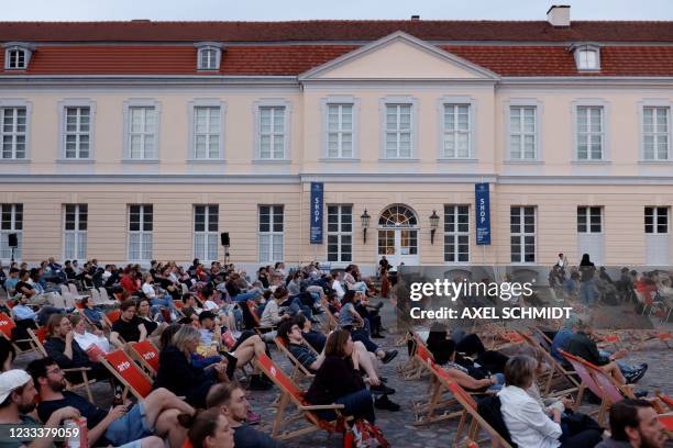 People await the screening of "Philly D A" as part of the 'Berlinale Summer Special' film festival in Berlin on June 10, 2021. - Due to the...