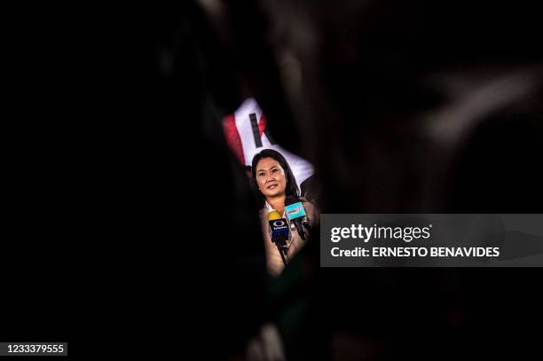 Peruvian right-wing presidential candidate for Fuerza Popular, Keiko Fujimori, delivers a press conference at her party headquarters in Lima on June...