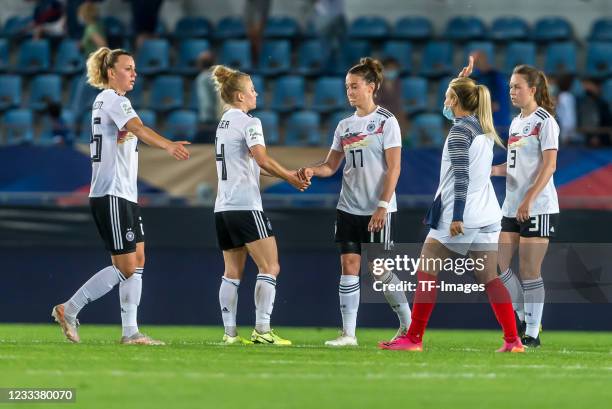 Lena Lattwein of Germany, Leonie Maier of Germany, Felicitas Rauch of Germany and Jana Feldkamp of Germany look dejected after the international...