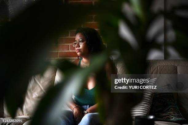 Venezuelan independent gender activist Andrea Hernandez speaks at her house about the "Yo si te creo" movement that was born in Venezuela regarding...